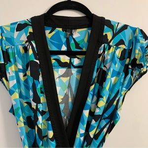Tahari fabulous wrap dress. Never worn. Multi colored shades of aqua blue. Med.